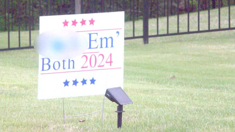 Controversial yard sign reading “F*** Em' Both 2024” in front of Julie Pereira's Lakeland home