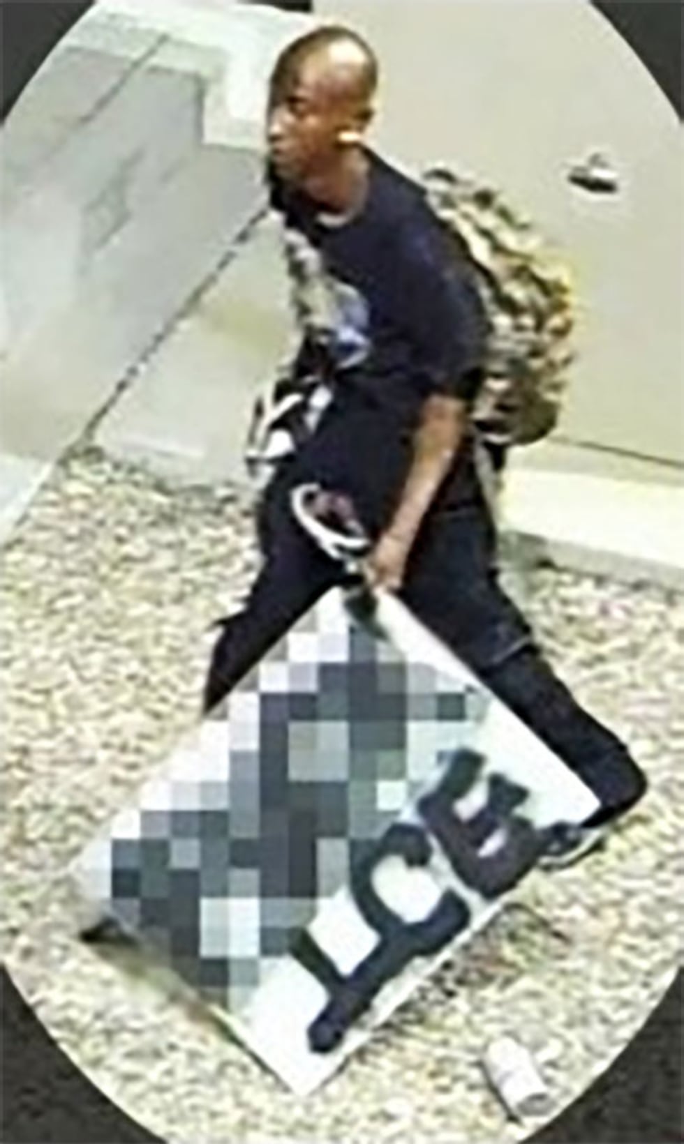 Photo shows a suspect who federal law enforcement officials say vandalized federal buildings...