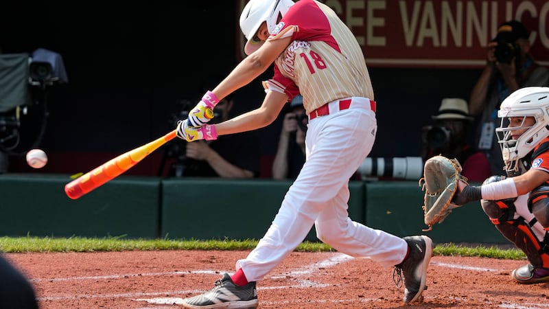Henderson, Nev.'s Wyatt Erickson hits a two-run double off Staten Island, N.Y.'s Stephen...