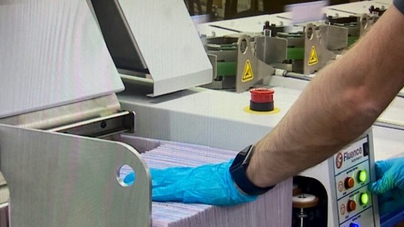 Election workers with ballots