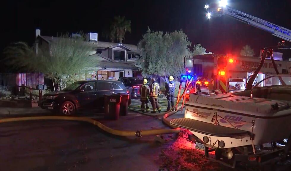 Henderson firefighters respond to a house fire on Windsor Drive Tuesday, Nov. 19, 2024.