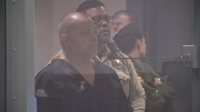 Robert Bell, Las Vegas officer facing domestic violence charges.