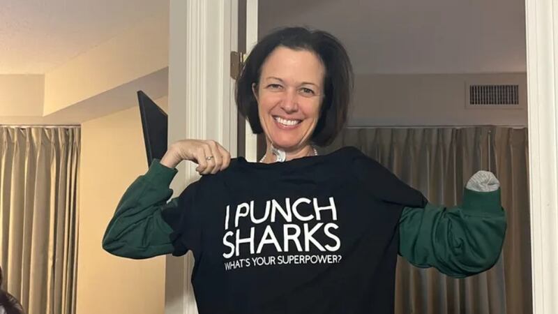 Elisabeth Foley lost her hand after she was bitten by a shark. She now hopes to raise money...