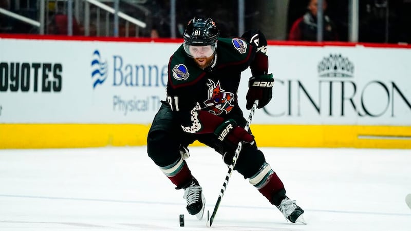 Arizona Coyotes right wing Phil Kessel skates with the puck against the St. Louis Blues during...