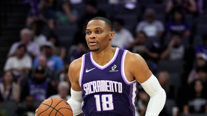 FILE - Sacramento Kings guard Russell Westbrook (18) dribbles the ball during the second half...