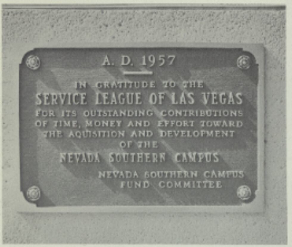 A plaque commemorating and honoring the community's support for bringing higher education to...
