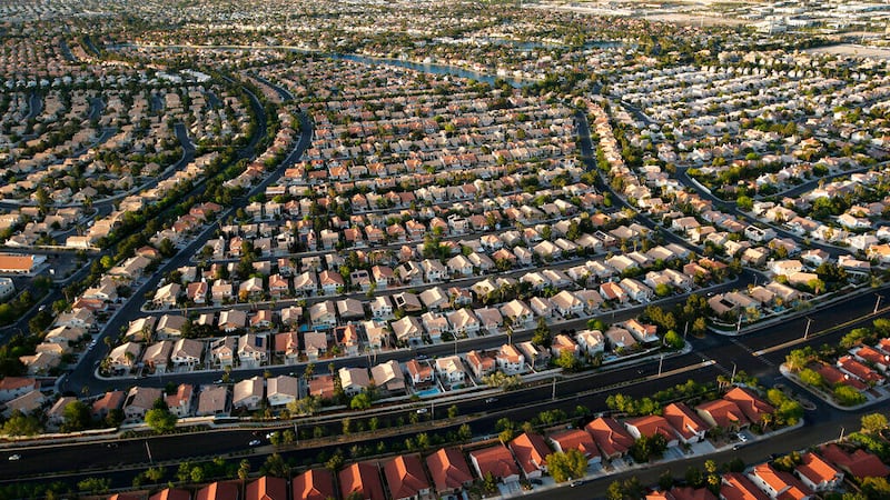 In this April 21, 2016 file photo, houses line streets near the edge of the Las Vegas Valley...