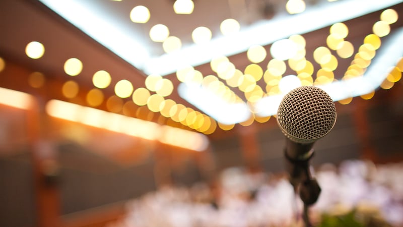 Close up of microphone in concert hall or conference room
