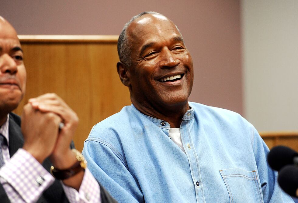 FILE - In this July 20, 2017, file photo, former NFL football star O.J. Simpson reacts after...