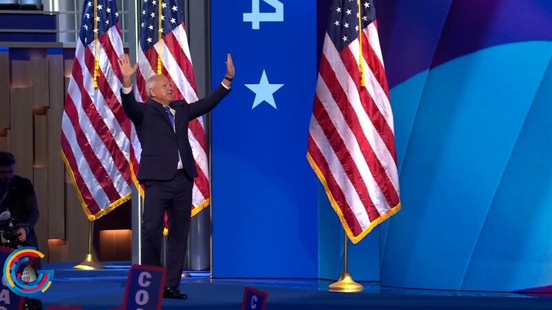 Tim Walz walking on stage at the 2024 Democratic National Convention