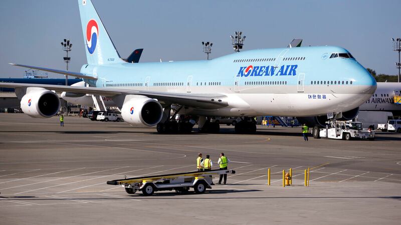 A Korean Air plane is seen on Tuesday, Aug. 25, 2015, in Everett, Wash. (AP Photo/Elaine...