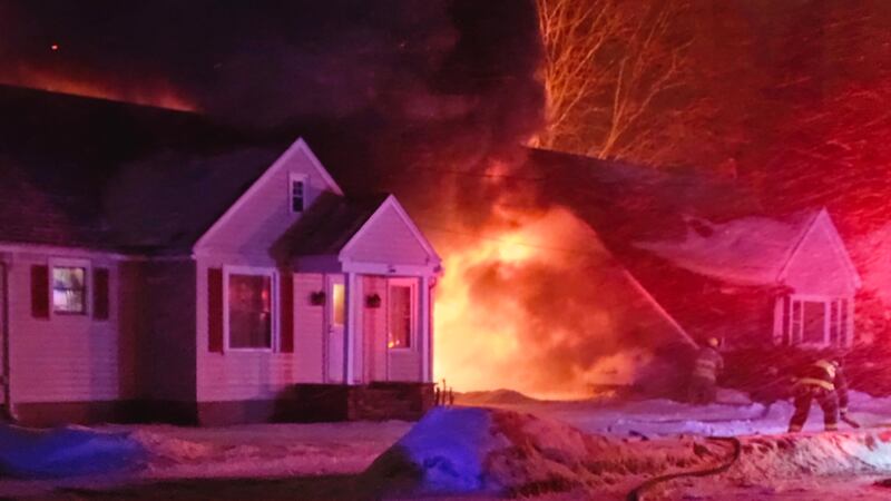 Witnesses said the fast-moving fire looked to have started at the back of the home.