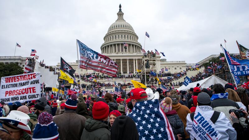 FILE - Insurrections loyal to President Donald Trump rally at the U.S. Capitol in Washington...