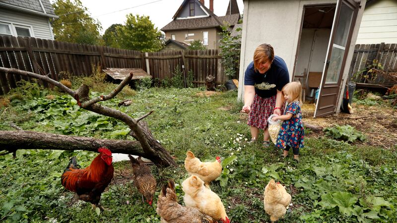 In this Tuesday, Sept. 26, 2017, photo, Tanya Keith, of Des Moines, Iowa, and her daughter...