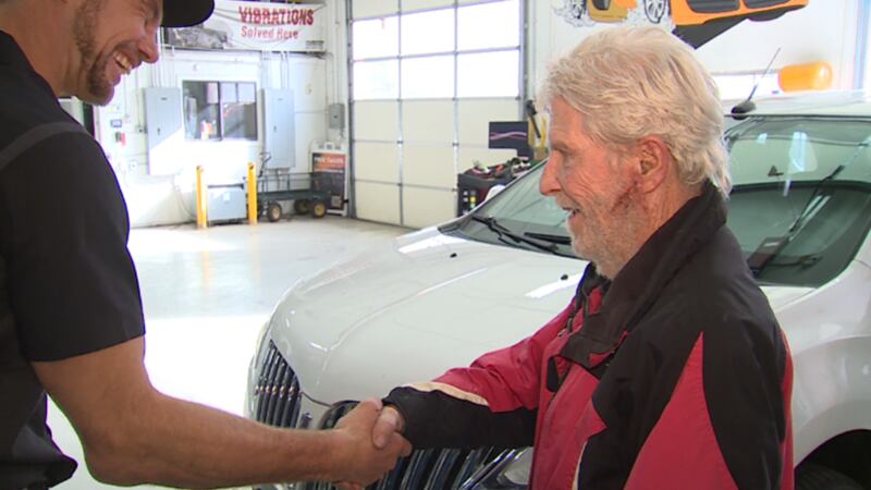 Air Force veteran Jimi Gill received congratulations from CoAuto owner Vinnie Lucido after...