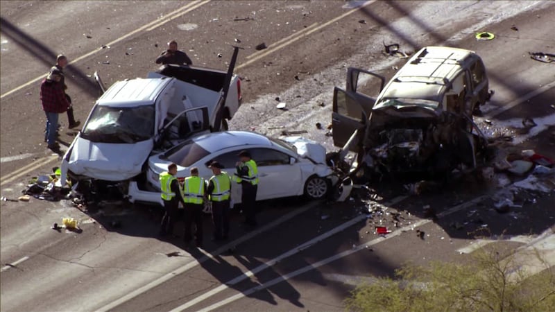 Two people have died and two kids are hospitalized after a three-vehicle crash on a Mesa roadway.