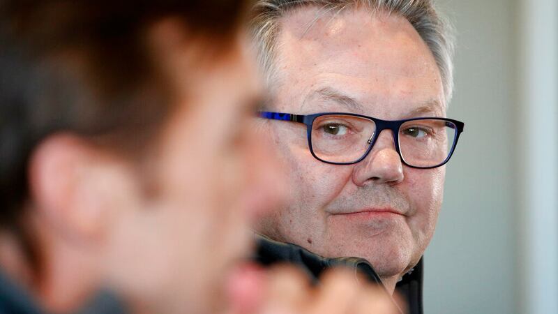 Kelly McCrimmon, right, new general manager of the Vegas Golden Knights hockey team, listens...