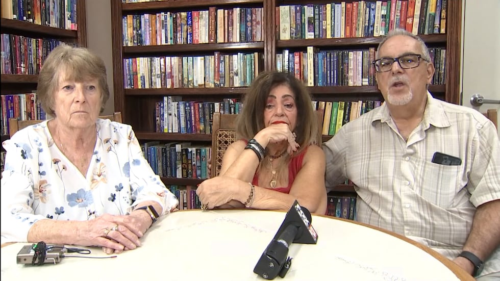 Neighbors Sigrid Monda, Virginia, and Michael Ponzi were among those who helped Robert when he...