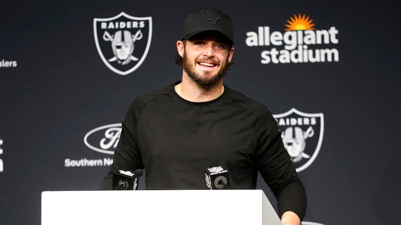 Las Vegas Raiders quarterback Derek Carr (4) attends a news conference after an NFL football...