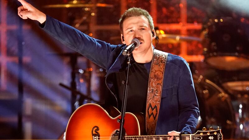 FILE - Morgan Wallen performs "Man Made a Bar" at the 57th Annual CMA Awards in Nashville,...