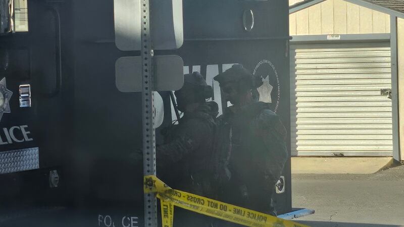 A woman is critically injured and the suspect is dead after a southeast Las Vegas barricade.