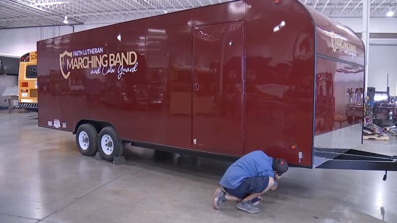 Las Vegas auto shop presents a brand-new truck to the Faith Lutheran High School marching band...