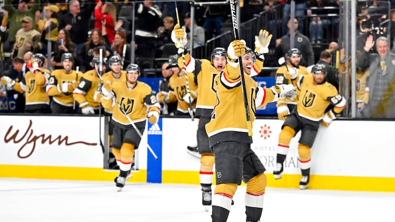 Vegas Golden Knights right wing Jonathan Marchessault (81) and the bench celebrate the winning...