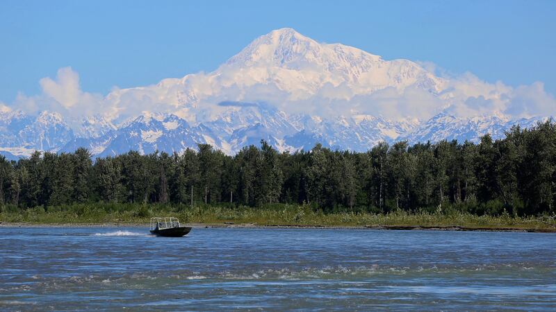 FILE - A boat is seen on the Susitna River near Talkeetna, Alaska, on Sunday, June 13, 2021,...
