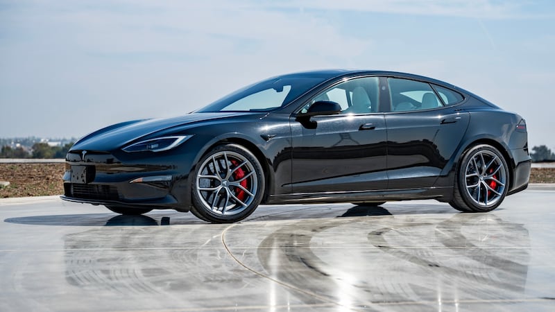 This photo provided by Tesla shows the Model S, one of the first mass-produced EVs. The base...