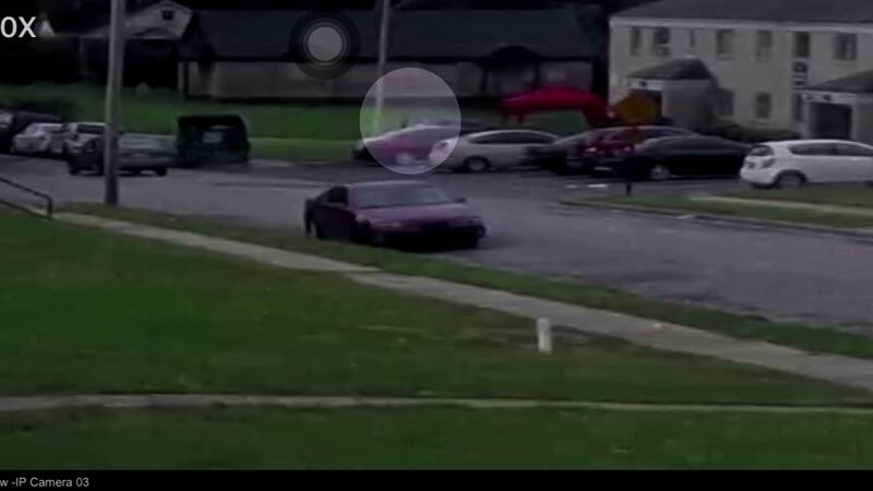 Surveillance footage shows suspect Cleotha Henderson and an unknown person cleaning the car in...