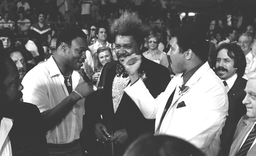 Muhammad Ali, Don King, and Larry Holmes at a ringside meet for Friday night fights for Holmes...