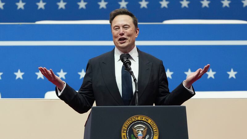 FILE - Elon Musk speaks at an indoor Presidential Inauguration parade event in Washington,...