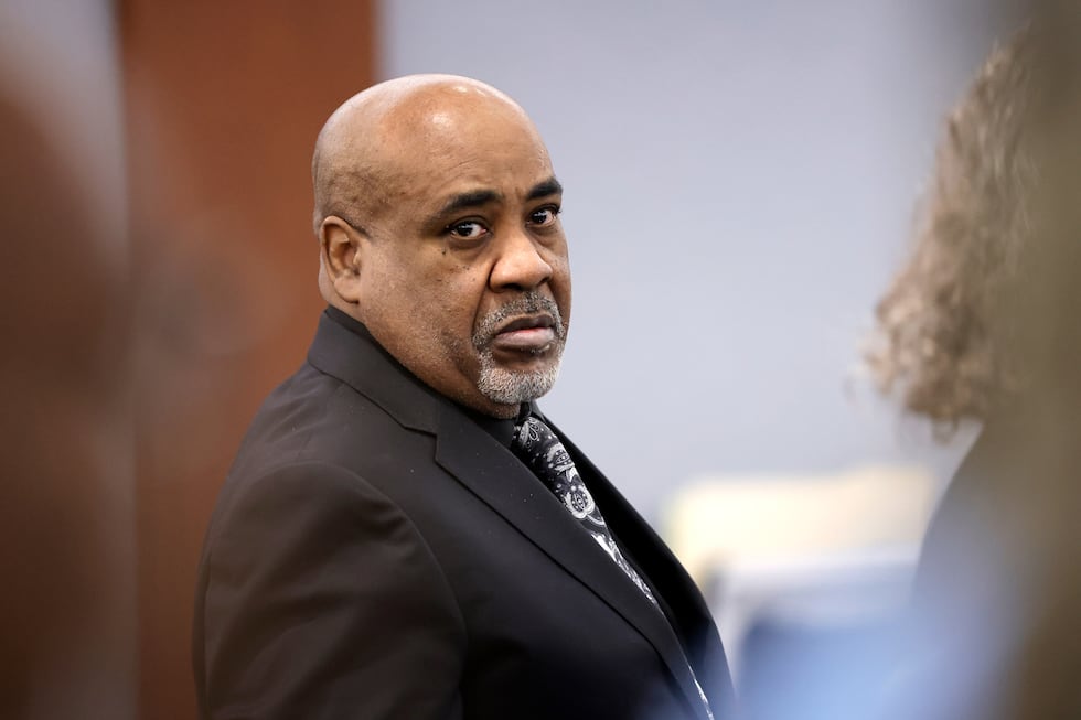 Duane Davis stands during a break in closing arguments during his murder trial, related to the...