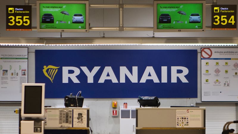 FILE - The Ryanair desk is seen, Aug. 10, 2018, at the Barajas airport in Madrid, Spain. (AP...