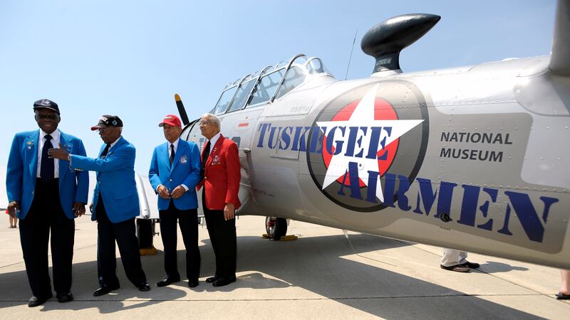 FILE - From left, retired Tuskeegee Airmen Lt. Col. Washington Ross, Lt. Col. Alexander...