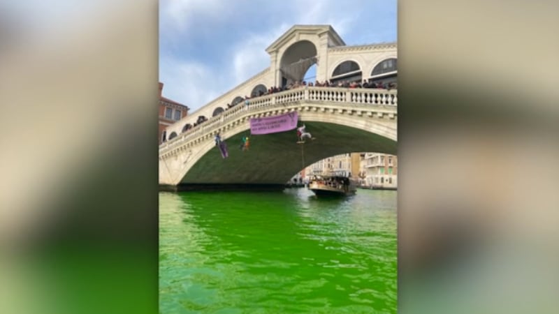 Climate activists turn water in Venice canal green