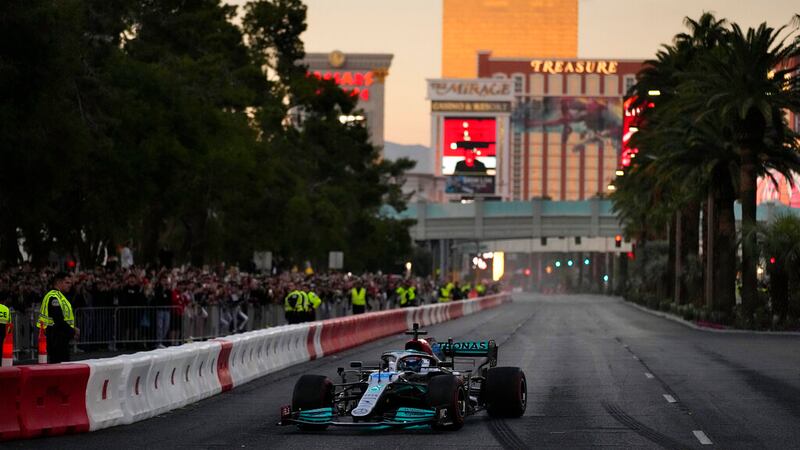 George Russell drives during a demonstration along the Las Vegas Strip at a launch party for...