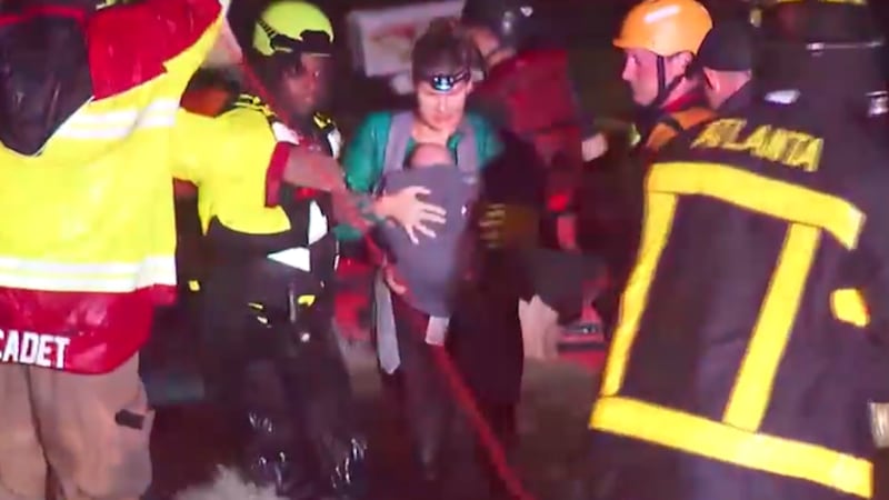 Woman with baby rescue