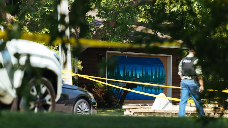 Law enforcement respond to a call at a home daycare, Wednesday, Aug. 12, 2026, in Hopkins, Minn.